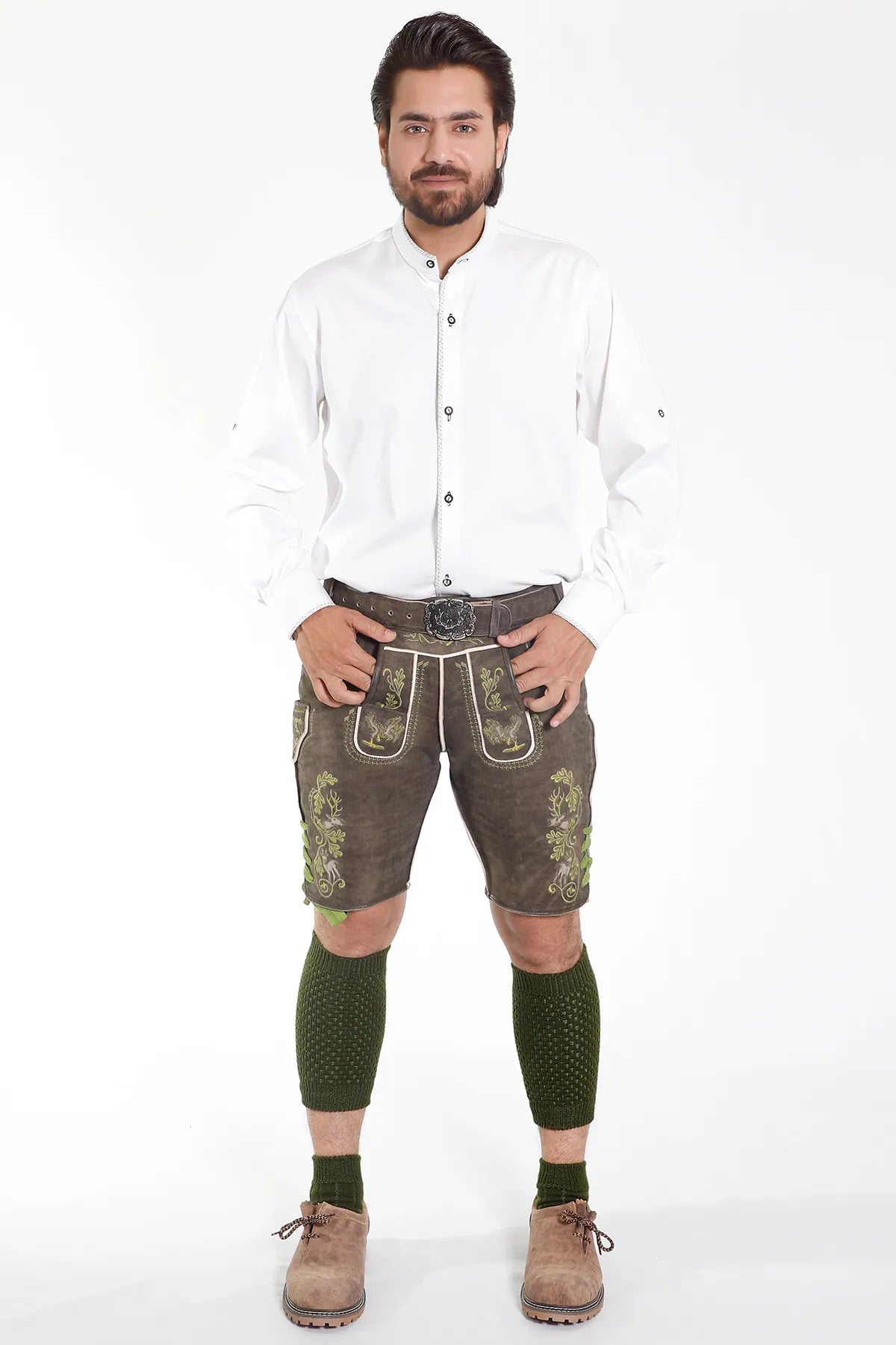Lederhosen Men in Forest Green. Model is wearing Traditional White Sheet, Bavarian Green Socks and Lederhosen Shoes