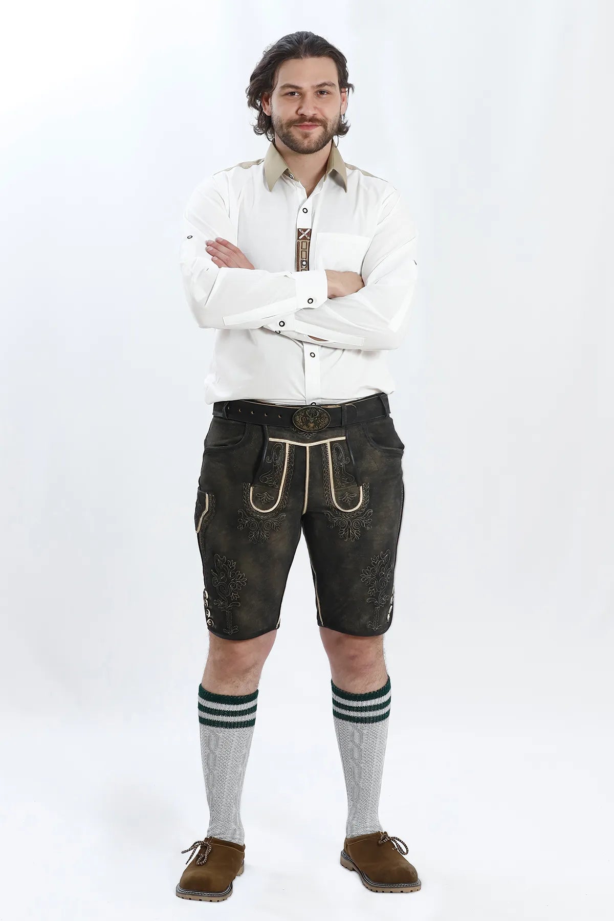 Lederhosen Men in Charcoal Black Color with Traditional Embroidery. Model is wearing white shirt and Traditional Bavarian Shoes.