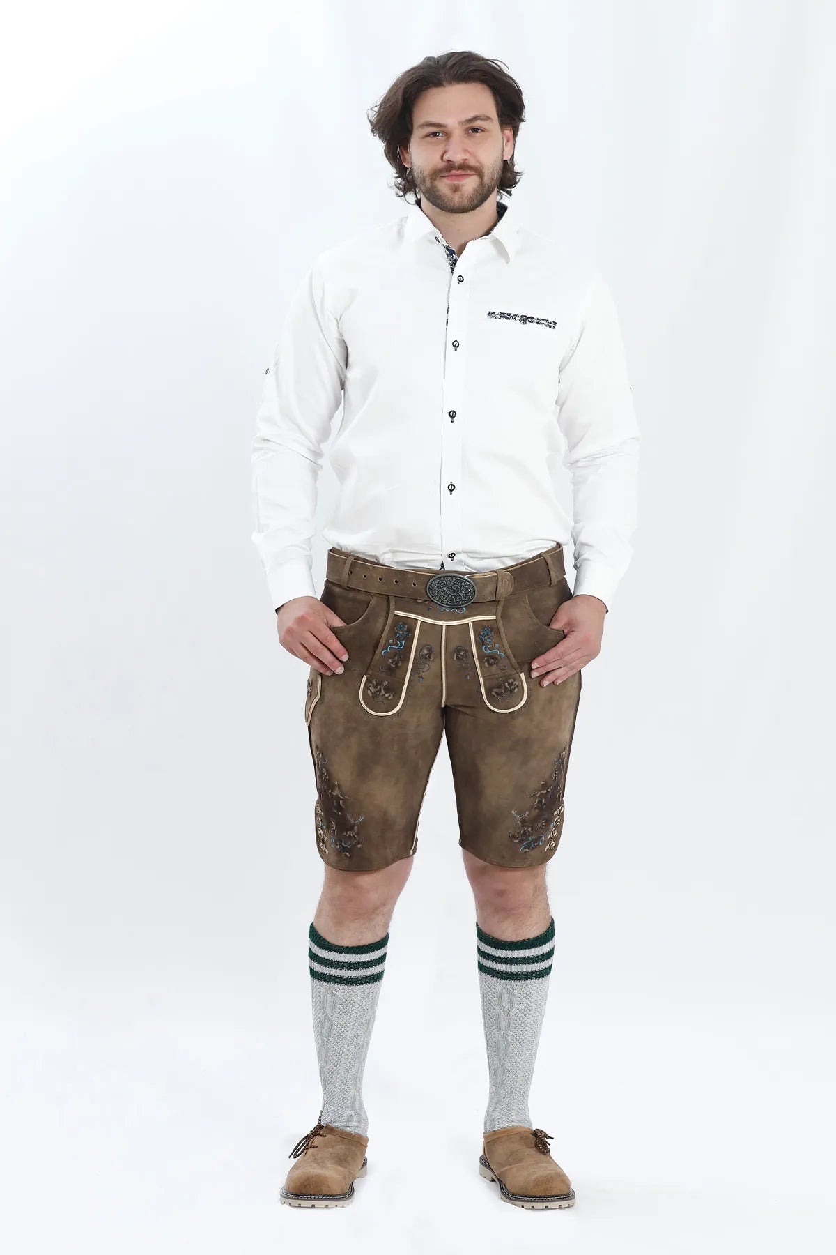 Lederhosen Men in Smoke Brown with Traditional Bavarian Multicolor Embroidery. Model is wearing Traditional White Shirt, Bavarian Socks and Smoke Brown Lederhosen Shoes.